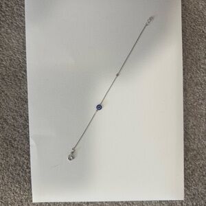 Elegant Silver Bracelet with Blue Charm